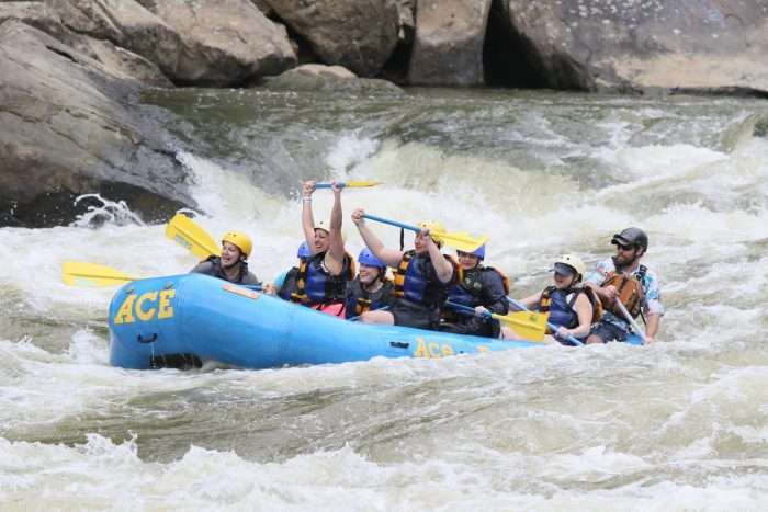 Group of women rafting with the guide