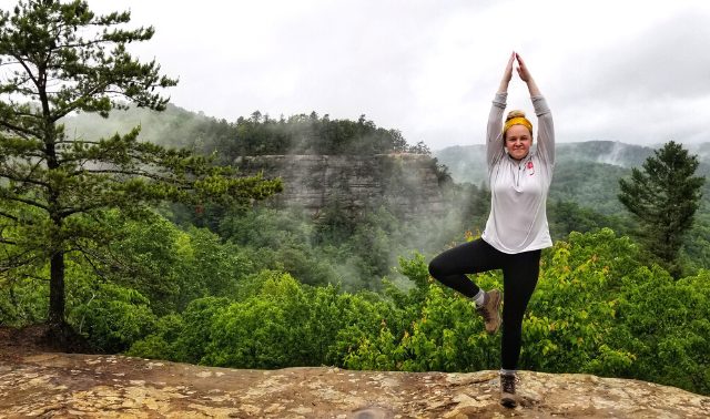 Woman doing a yoga pose on the Appalachian Trail.