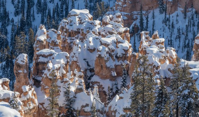 Hoodoos covered in snow near Moab in winter.