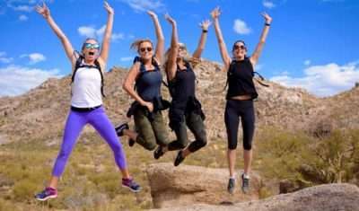Group of women jumping in the air