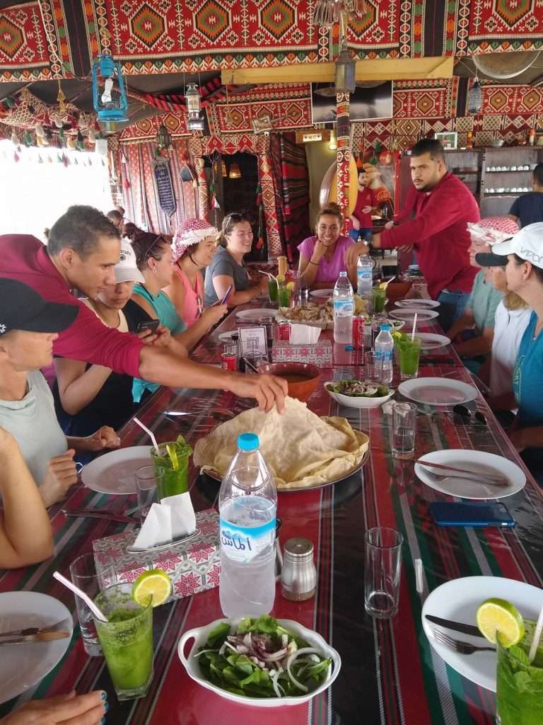 explorer chicks eating lunch in Jordan on guided adventure tour